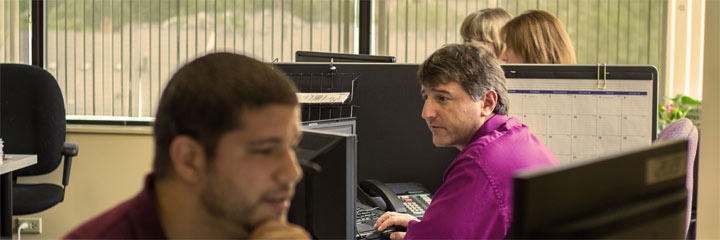 Team member working on computer